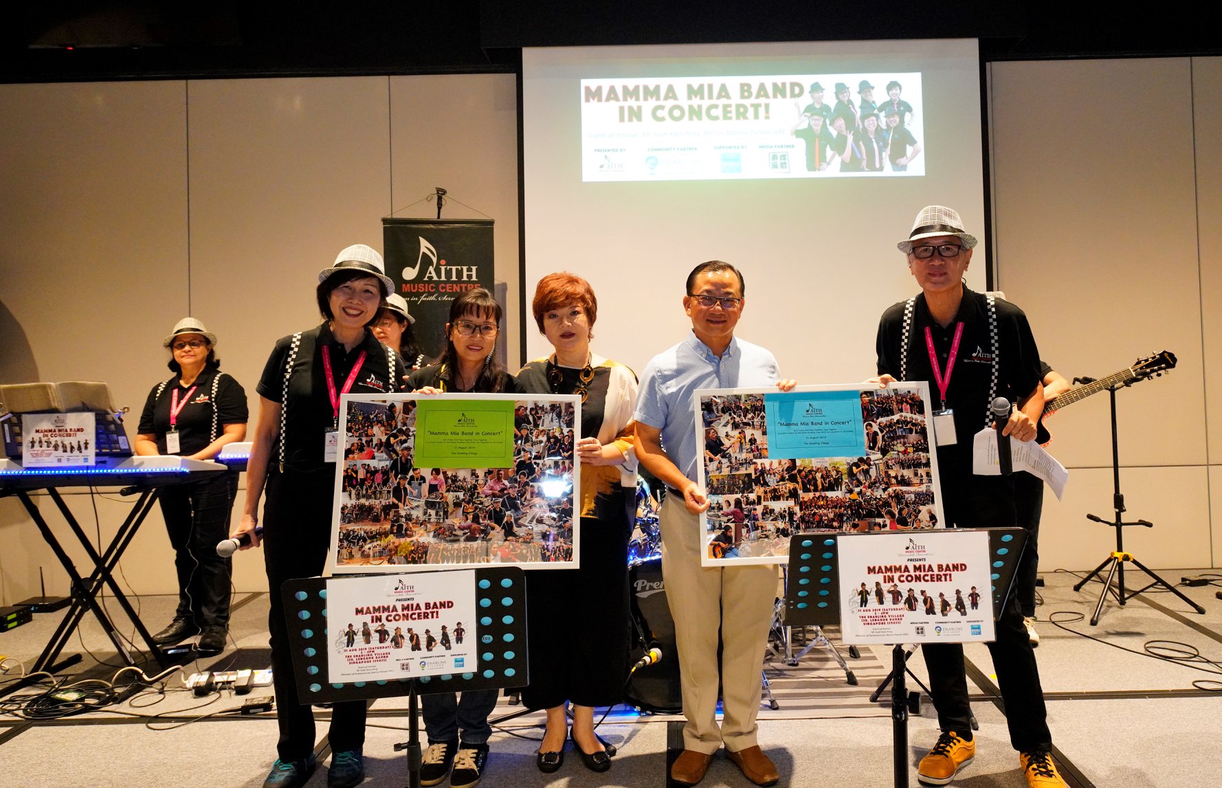 Photograph of Mamma Mia Band, Ms Koon Im Guek, Head of Enabling Lives Initiative Grant Team and Mr Seah Kian Peng, MP for Marine Parade GRC and Chairman of the Government Parliament Committee for Ministry of Social and Family Development.Photograph of Mamma Mia Band, Ms Koon Im Guek, Head of Enabling Lives Initiative Grant Team and Mr Seah Kian Peng, MP for Marine Parade GRC and Chairman of the Government Parliament Committee for Ministry of Social and Family Development.